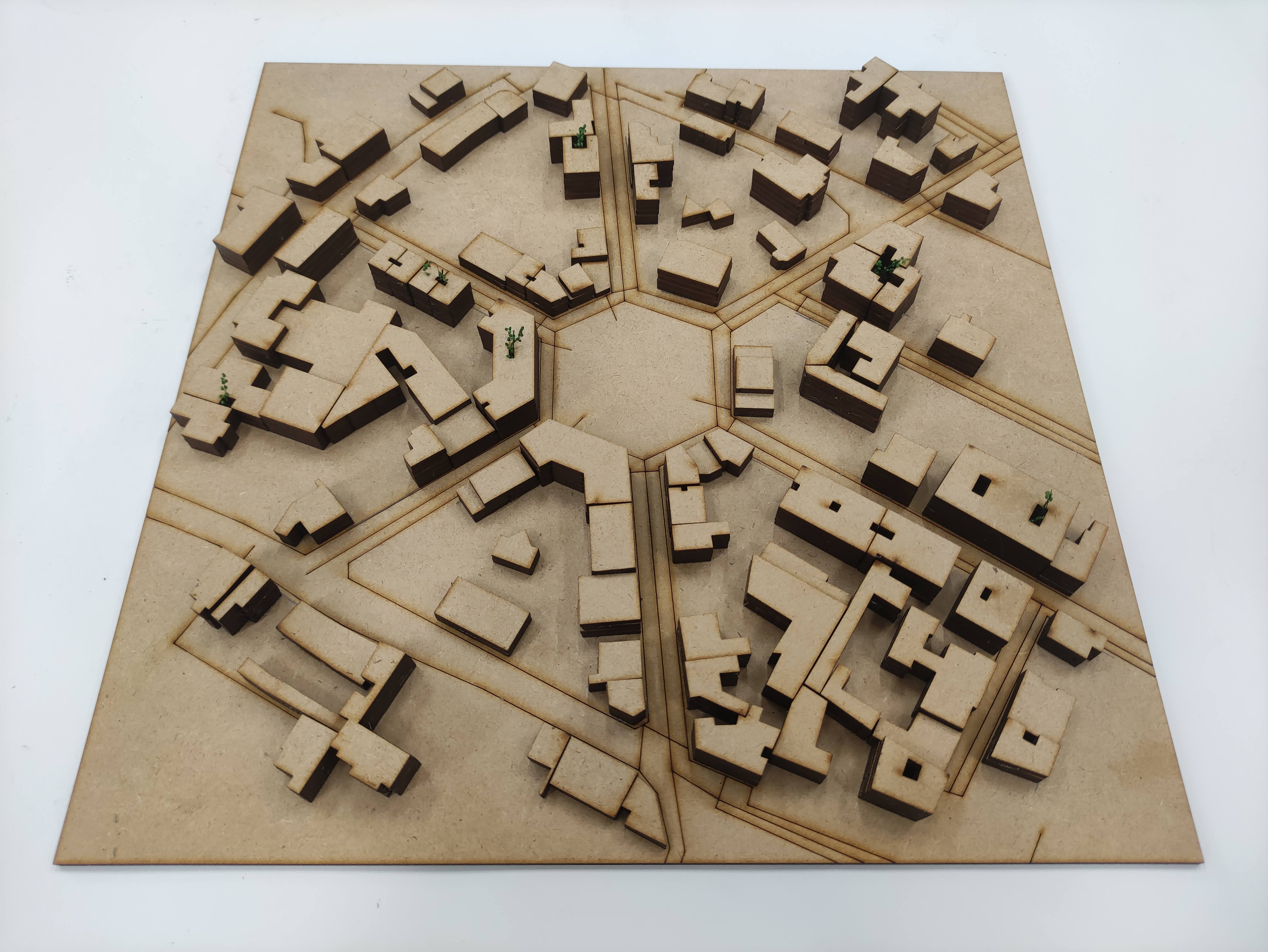 Lasercut scale model of street intersection.